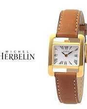 Michel Herbelin horloge " Veme Avenue " zwitsers uurwerk, stalen kast is Pvd geel gecoat, saffierglas en voorzien van een bruine lederen band , model 17037/P01GO - 214716