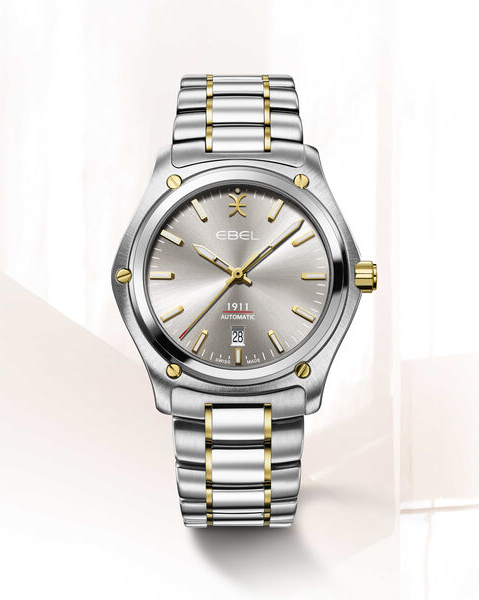 Ebel horloge, 1911 automaat Gent 42mm, kast is een combinatie van staal met 18 krt geelgoud, band is een combinatie van staal met Yellow PVD, zilvergrijze wijzerplaat zijn verfraaid met goudkleurige wijzers en indexen, saffieglas en 100l m WD, glazen deks