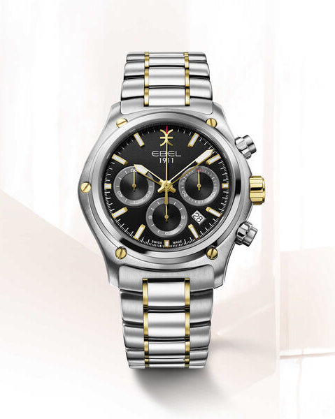 staal/18krt gouden Ebel 1911 automaat chronograaf, kast is een combinatie van staal en 18 krt goud, de band is een combinatie van staal met pvd geel. Horloge is voorzien van een saffierglas en is 100 m WD en een zwarte wijzerplaat met streepindex en datum